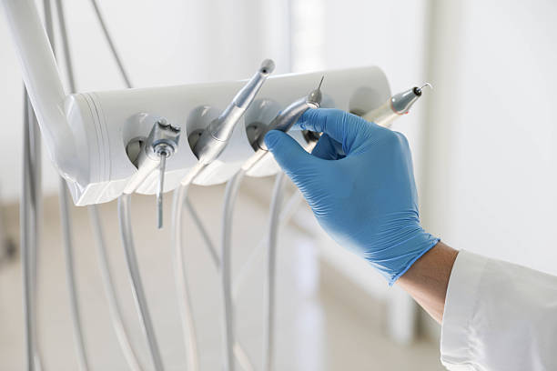 Professional Tooth Extraction technician working in Clermont, FL